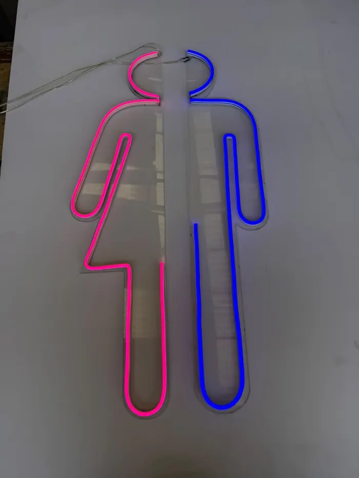 Señalética luminosa de sanitarios en neón LED rosa y azul